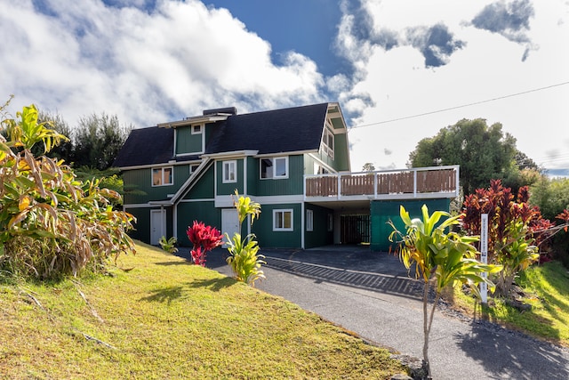 64-660 Puu Olu Pl, Kamuela, HI 96743 - back of property with a yard and asphalt driveway