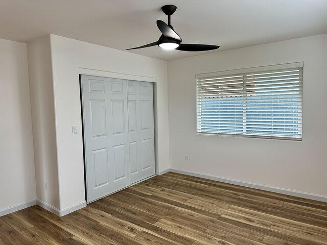64-5304 Puu Nani Dr, Kamuela, HI 96743 - unfurnished bedroom featuring wood finished floors, a closet, and a ceiling fan