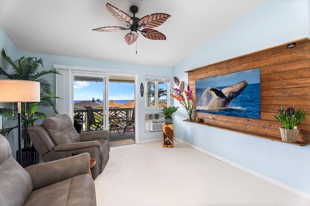 75-6009 Alii Dr Unit K22, Kailua-Kona, HI 96740 - carpeted living room with ceiling fan, baseboards, and vaulted ceiling
