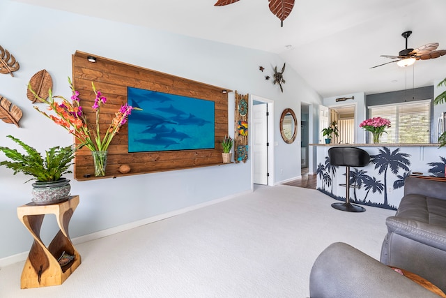 75-6009 Alii Dr Unit K22, Kailua-Kona, HI 96740 - carpeted living area with a ceiling fan, lofted ceiling, and baseboards