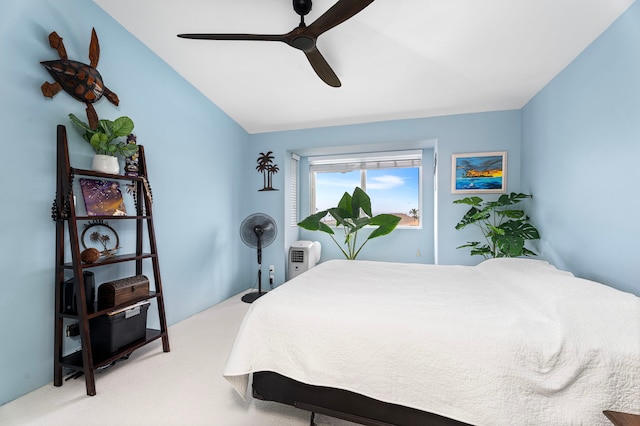 75-6009 Alii Dr Unit K22, Kailua-Kona, HI 96740 - bedroom featuring light carpet and ceiling fan
