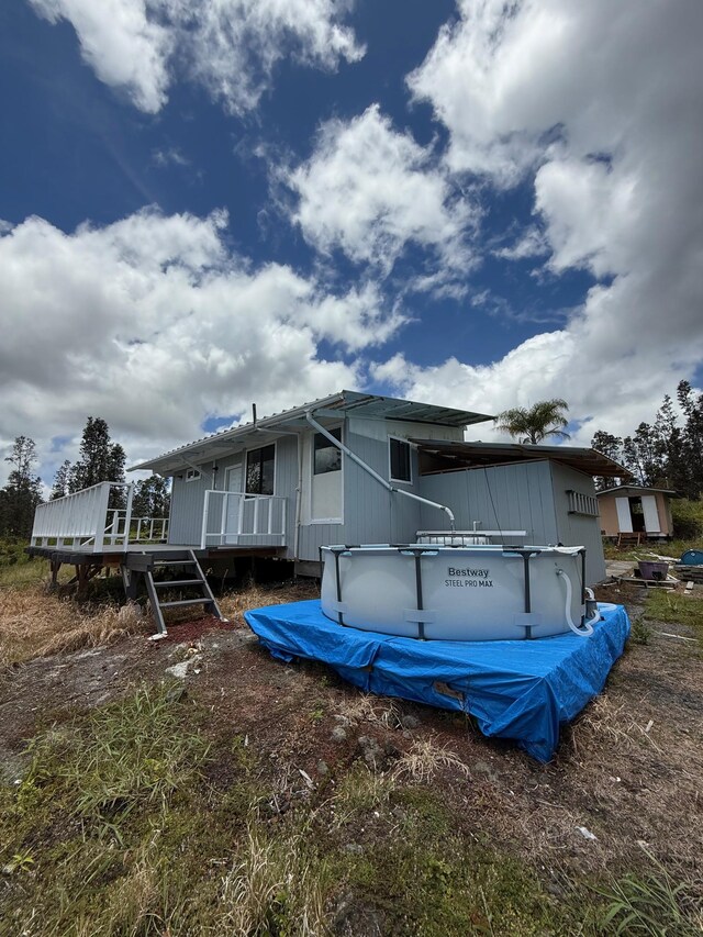 11-2828 Lehua St, Mountain View, HI 96771 - rear view of property featuring a wooden deck