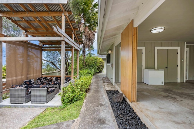 73-4332 Imo Pl, Kailua-Kona, HI 96740 - view of property exterior with an outdoor hangout area and a patio