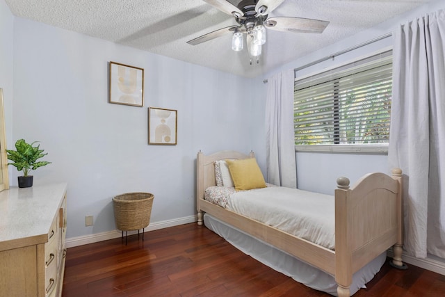 73-4332 Imo Pl, Kailua-Kona, HI 96740 - bedroom featuring wood finished floors, a textured ceiling, and ceiling fan