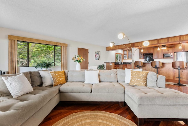 73-4332 Imo Pl, Kailua-Kona, HI 96740 - living area with dark wood-style floors