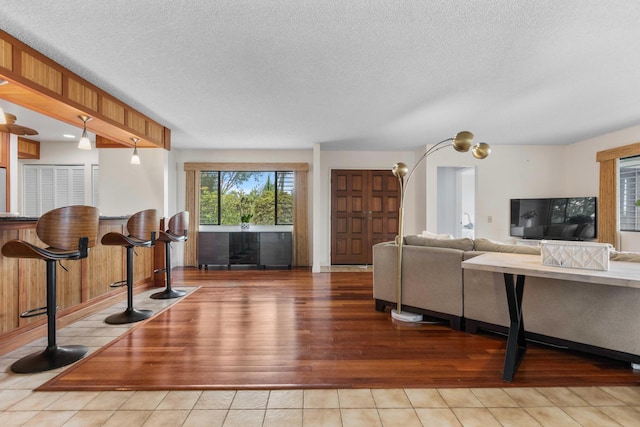 73-4332 Imo Pl, Kailua-Kona, HI 96740 - living room featuring wood finished floors and a textured ceiling