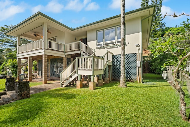 3585 Alaloke Pl, Kalaheo, HI 96756 - rear view of property featuring a ceiling fan, a yard, and stairs