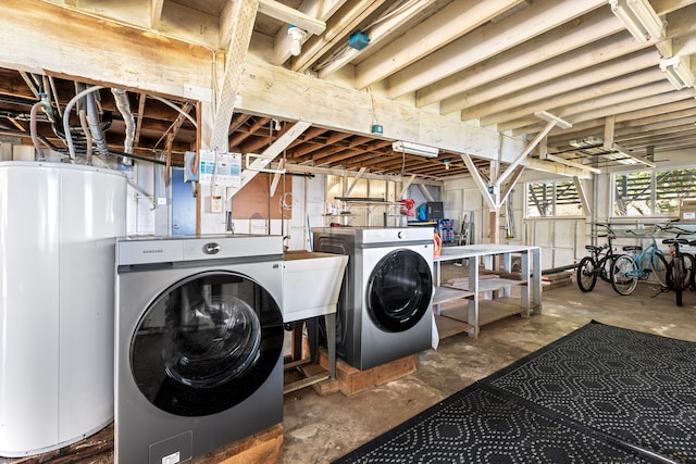 36-2333 Old Mamalahoa Hwy, Laupahoehoe, HI 96764 - laundry room featuring water heater, independent washer and dryer, and a workshop area