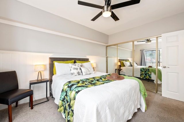 75-5719 Alii Dr Unit 321, Kailua-Kona, HI 96740 - bedroom with carpet floors, wainscoting, a ceiling fan, and a closet