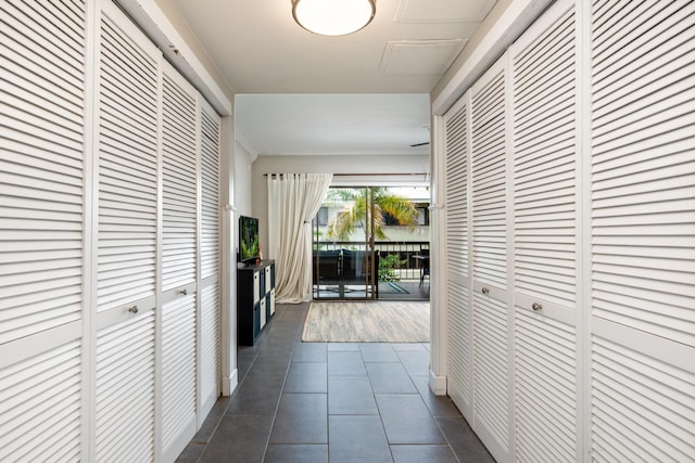 75-5719 Alii Dr Unit 321, Kailua-Kona, HI 96740 - corridor with dark tile patterned floors