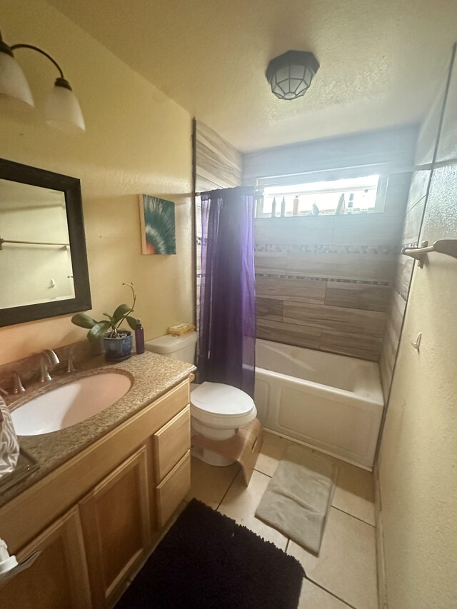 1370 Honoohala Pl, Kapaa, HI 96746 - bathroom with tile patterned floors, shower / bath combo, vanity, and toilet