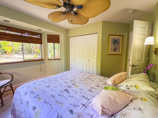 15-1500 10th Ave, Keaau, HI 96749 - bedroom with a closet, baseboards, and ceiling fan