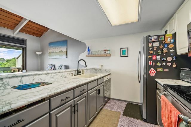 4460 Ikena Pl Unit 54, Kalaheo, HI 96741 - kitchen featuring electric range oven, gray cabinets, dishwasher, vaulted ceiling, and light stone counters