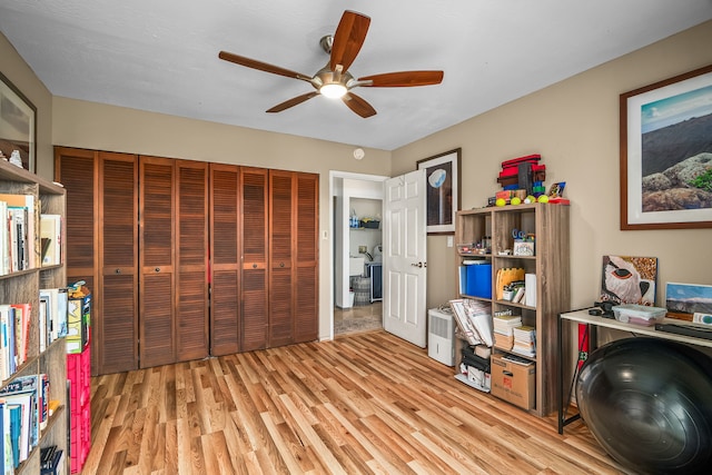4460 Ikena Pl Unit 54, Kalaheo, HI 96741 - office space featuring ceiling fan and light wood-style floors