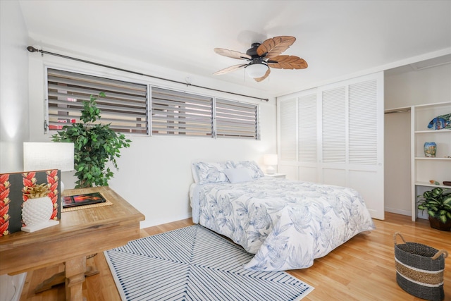 75-5873 Walua Rd Unit 312, Kailua-Kona, HI 96740 - bedroom featuring wood finished floors, a closet, and a ceiling fan