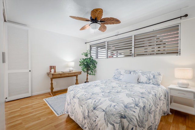 75-5873 Walua Rd Unit 312, Kailua-Kona, HI 96740 - bedroom with wood finished floors and ceiling fan