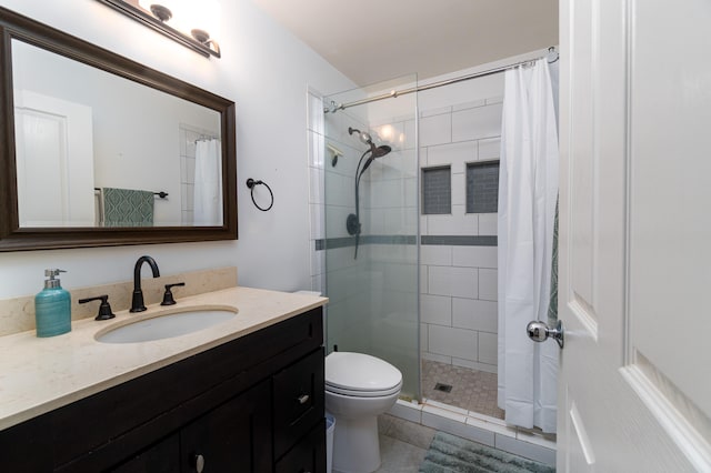 75-6081 Alii Dr Unit Kk102, Kailua-Kona, HI 96740 - full bathroom featuring a stall shower, vanity, toilet, and tile patterned floors