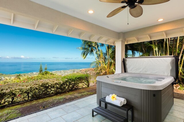 76-987 Aeo St, Kailua-Kona, HI 96740 - view of patio featuring a hot tub, a water view, and ceiling fan