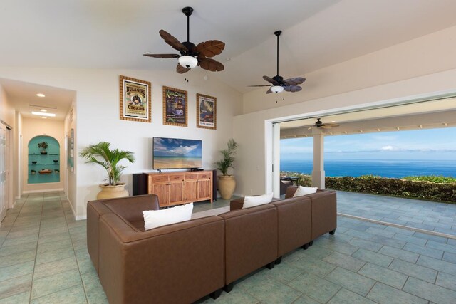 76-987 Aeo St, Kailua-Kona, HI 96740 - living area featuring vaulted ceiling, light tile patterned floors, and a ceiling fan