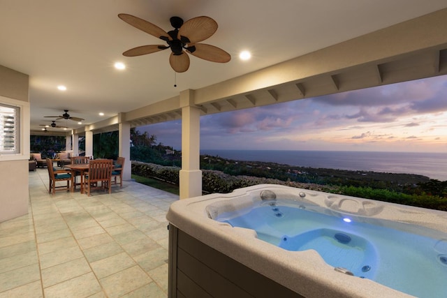 76-987 Aeo St, Kailua-Kona, HI 96740 - view of pool with a ceiling fan, a hot tub, outdoor dining area, a patio, and a water view