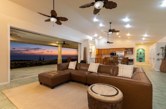 76-987 Aeo St, Kailua-Kona, HI 96740 - living area with light tile patterned floors, a ceiling fan, high vaulted ceiling, and baseboards
