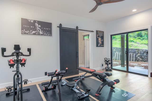 75-650 Halewili Pl, Kailua-Kona, HI 96725 - workout area featuring a barn door, a ceiling fan, recessed lighting, and wood finished floors