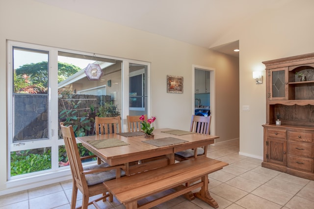 75-5614-R Hienaloli Rd, Kailua-Kona, HI 96740 - dining space featuring light tile patterned floors and vaulted ceiling