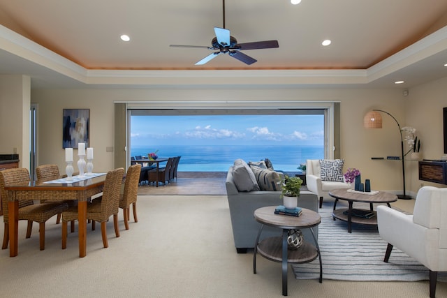 76-853 N Pakalakala Pl, Kailua-Kona, HI 96740 - living room featuring a tray ceiling, recessed lighting, ornamental molding, a ceiling fan, and light carpet