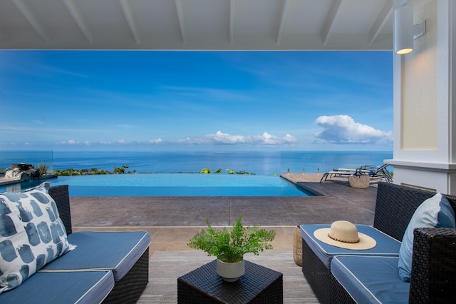 76-853 N Pakalakala Pl, Kailua-Kona, HI 96740 - view of patio / terrace featuring a water view and an outdoor hangout area