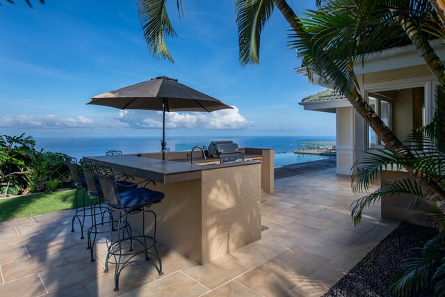 76-853 N Pakalakala Pl, Kailua-Kona, HI 96740 - view of patio / terrace featuring a water view and area for grilling
