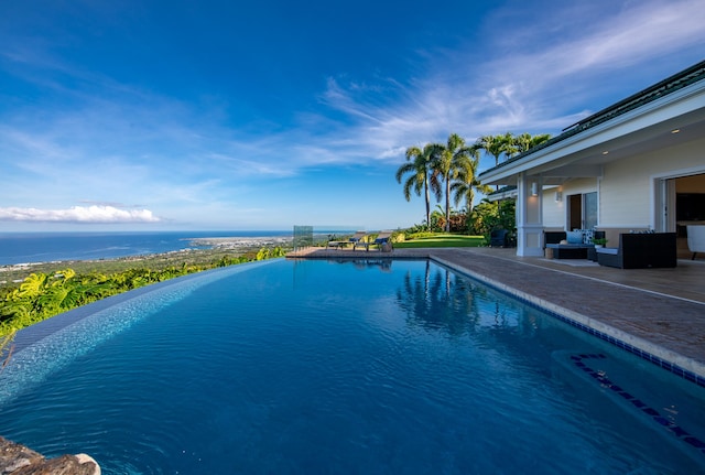 76-853 N Pakalakala Pl, Kailua-Kona, HI 96740 - view of swimming pool with outdoor lounge area, a patio area, and an infinity pool