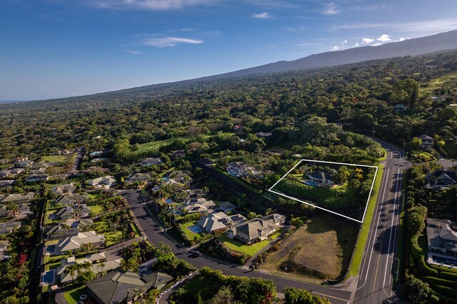 76-853 N Pakalakala Pl, Kailua-Kona, HI 96740 - aerial view of residential area featuring property boundaries highlighted and mountains