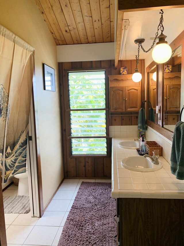 76-6252 Kokoolua Way, Kailua-Kona, HI 96740 - full bathroom with double vanity, tile patterned floors, wooden ceiling, and wood walls