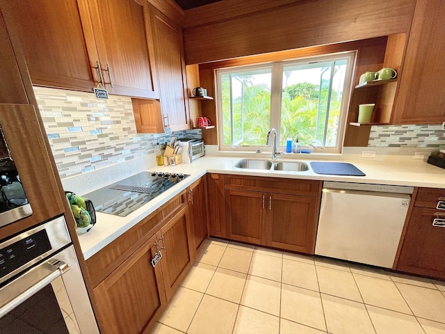 76-6252 Kokoolua Way, Kailua-Kona, HI 96740 - kitchen featuring dishwasher, open shelves, oven, decorative backsplash, and light countertops