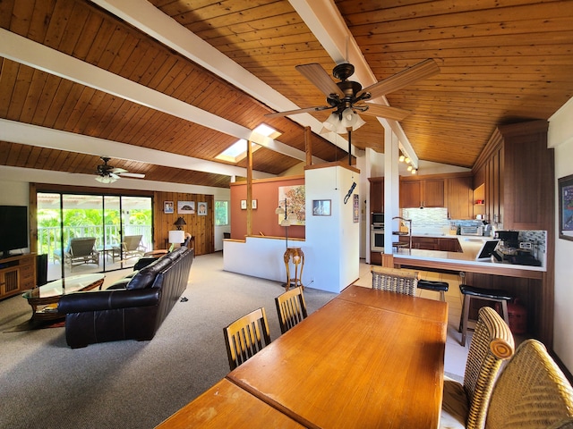 76-6252 Kokoolua Way, Kailua-Kona, HI 96740 - dining room featuring a ceiling fan, wood ceiling, light colored carpet, and a skylight