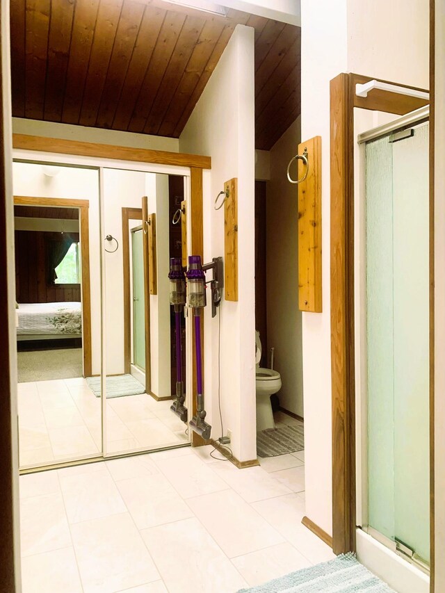 76-6252 Kokoolua Way, Kailua-Kona, HI 96740 - hallway with lofted ceiling, wood ceiling, and tile patterned floors