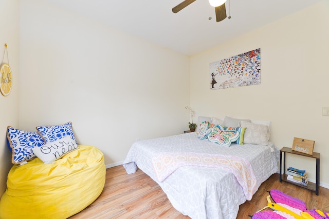 73-1102 Nuuanu Pl Unit F203, Kailua-Kona, HI 96740 - bedroom featuring wood finished floors and a ceiling fan
