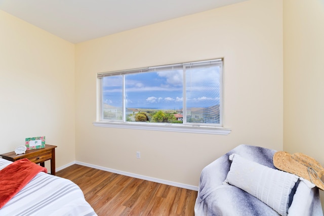 73-1102 Nuuanu Pl Unit F203, Kailua-Kona, HI 96740 - bedroom with wood finished floors and baseboards