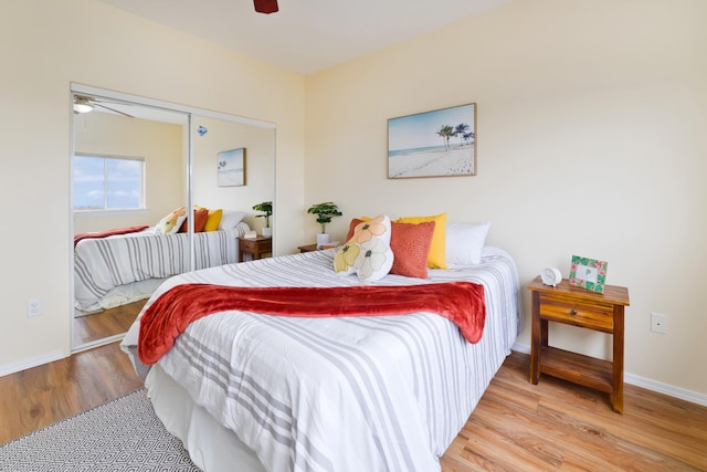 73-1102 Nuuanu Pl Unit F203, Kailua-Kona, HI 96740 - bedroom with wood finished floors, a closet, and ceiling fan
