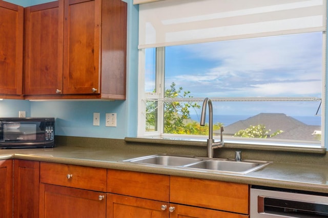 75-650 Mea Lanakila St, Kailua-Kona, HI 96740 - kitchen with black microwave, stainless steel dishwasher, and brown cabinets