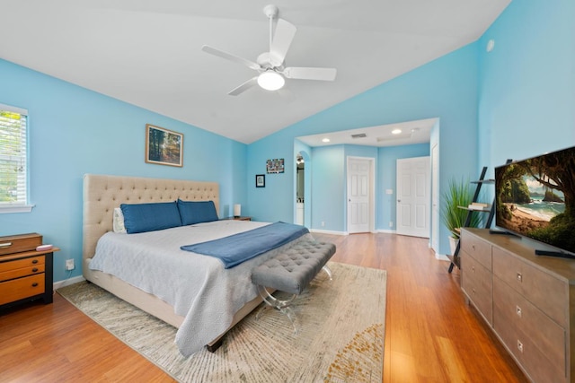 75-650 Mea Lanakila St, Kailua-Kona, HI 96740 - bedroom with light wood-style floors, vaulted ceiling, and a ceiling fan