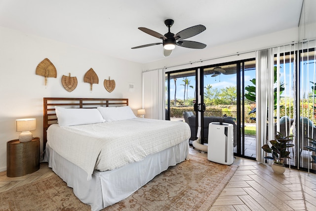 78-7070 Alii Dr Unit E103, Kailua-Kona, HI 96740 - bedroom with access to outside and a ceiling fan