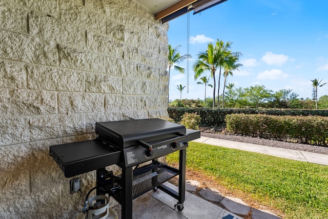 78-7070 Alii Dr Unit E103, Kailua-Kona, HI 96740 - view of patio with a grill