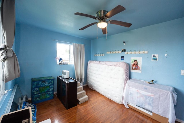 16-2041 Emerald Dr, Pahoa, HI 96778 - bedroom featuring wood finished floors and a ceiling fan