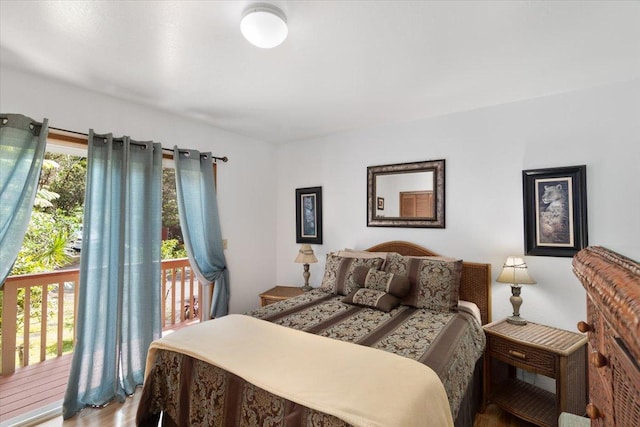 11-3868 Liona St, Volcano, HI 96785 - bedroom with access to outside and wood finished floors