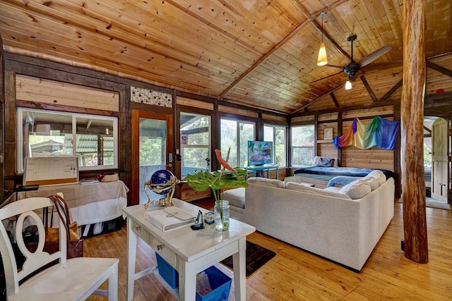 13-1312 Malama St, Pahoa, HI 96778 - living room with wooden ceiling, hardwood / wood-style flooring, plenty of natural light, a ceiling fan, and vaulted ceiling