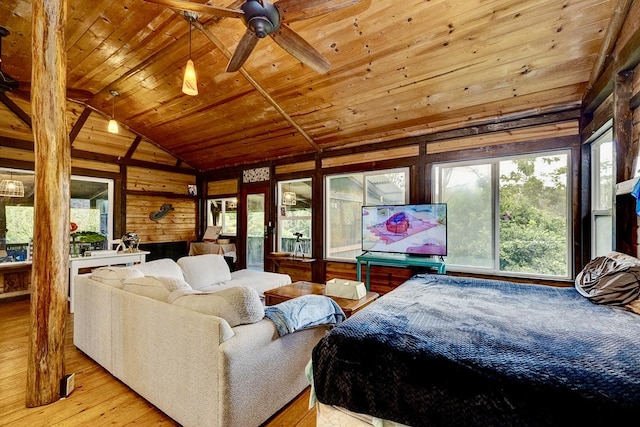 13-1312 Malama St, Pahoa, HI 96778 - bedroom with multiple windows, wood-type flooring, wood walls, wood ceiling, and lofted ceiling