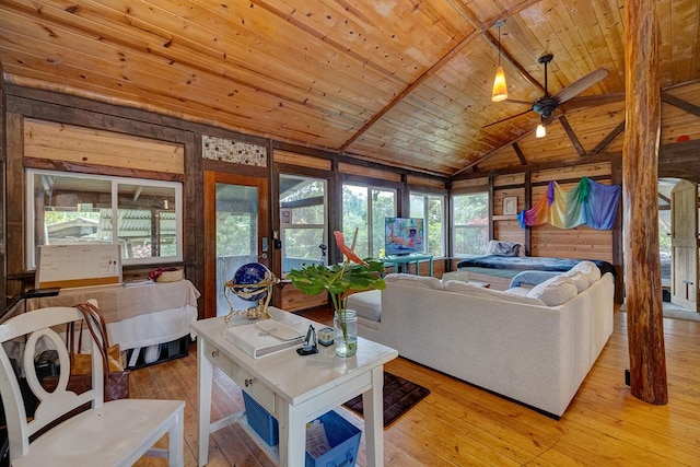 13-1312 Malama St, Pahoa, HI 96778 - living area with wood ceiling, a ceiling fan, lofted ceiling, plenty of natural light, and hardwood / wood-style flooring