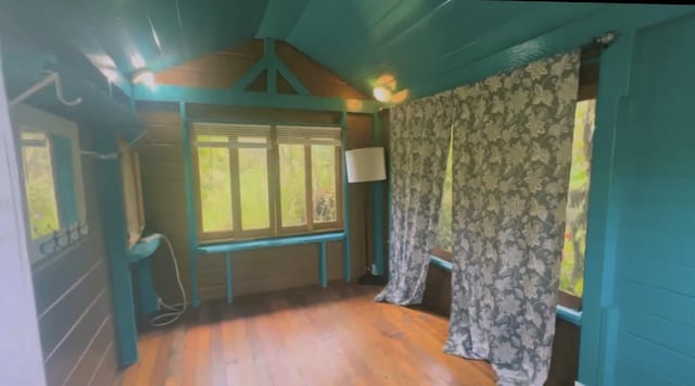 13-1312 Malama St, Pahoa, HI 96778 - unfurnished room with wood finished floors and vaulted ceiling