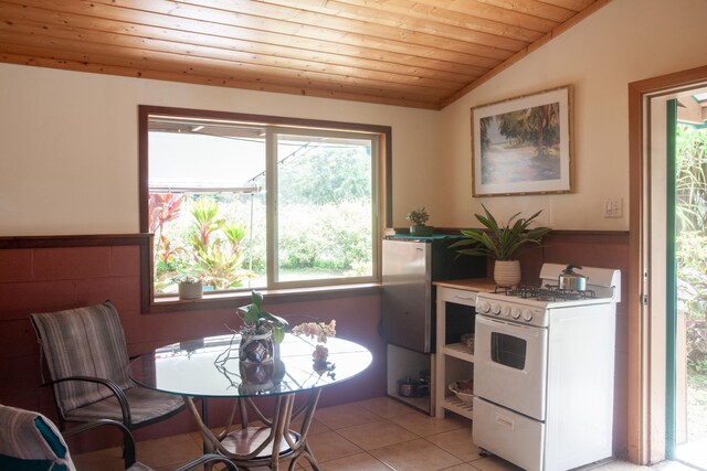 15-2045 8th Ave, Keaau, HI 96749 - kitchen featuring white gas range oven, wooden ceiling, lofted ceiling, light tile patterned flooring, and light countertops